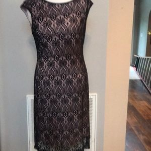 Black lace and pink sheath dress.